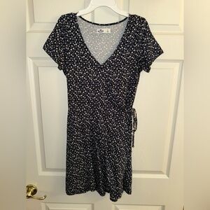 Hollister. Size S. Navy with white flowers.